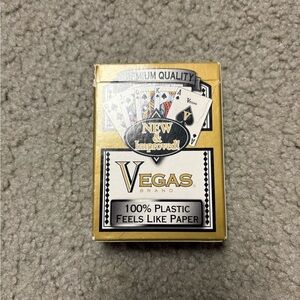 Lightly used gold backed Vegas deck of playing cards